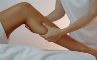 Osteopath treating a leg